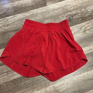 Brand new without tags Lululemon red shorts